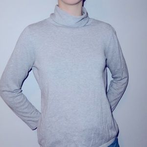 Grey turtle neck. Size small. Fits small and medium.